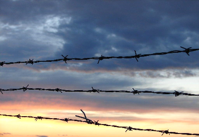 GOD’S BARBED WIRE FENCES