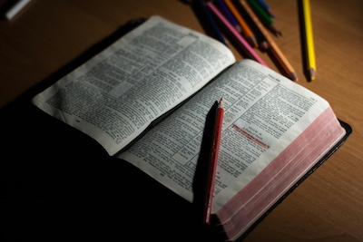 Featured Photo by John-Mark Smith from https://www.pexels.com/photo/pink-pencil-on-open-bible-page-and-pink-272337